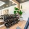 free weights in fitness center with recessed lighting