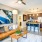 well lit living room open to kitchen