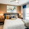 large windows fill bedroom with natural lighting