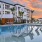 in-pool lounge chairs in outdoor swimming pool